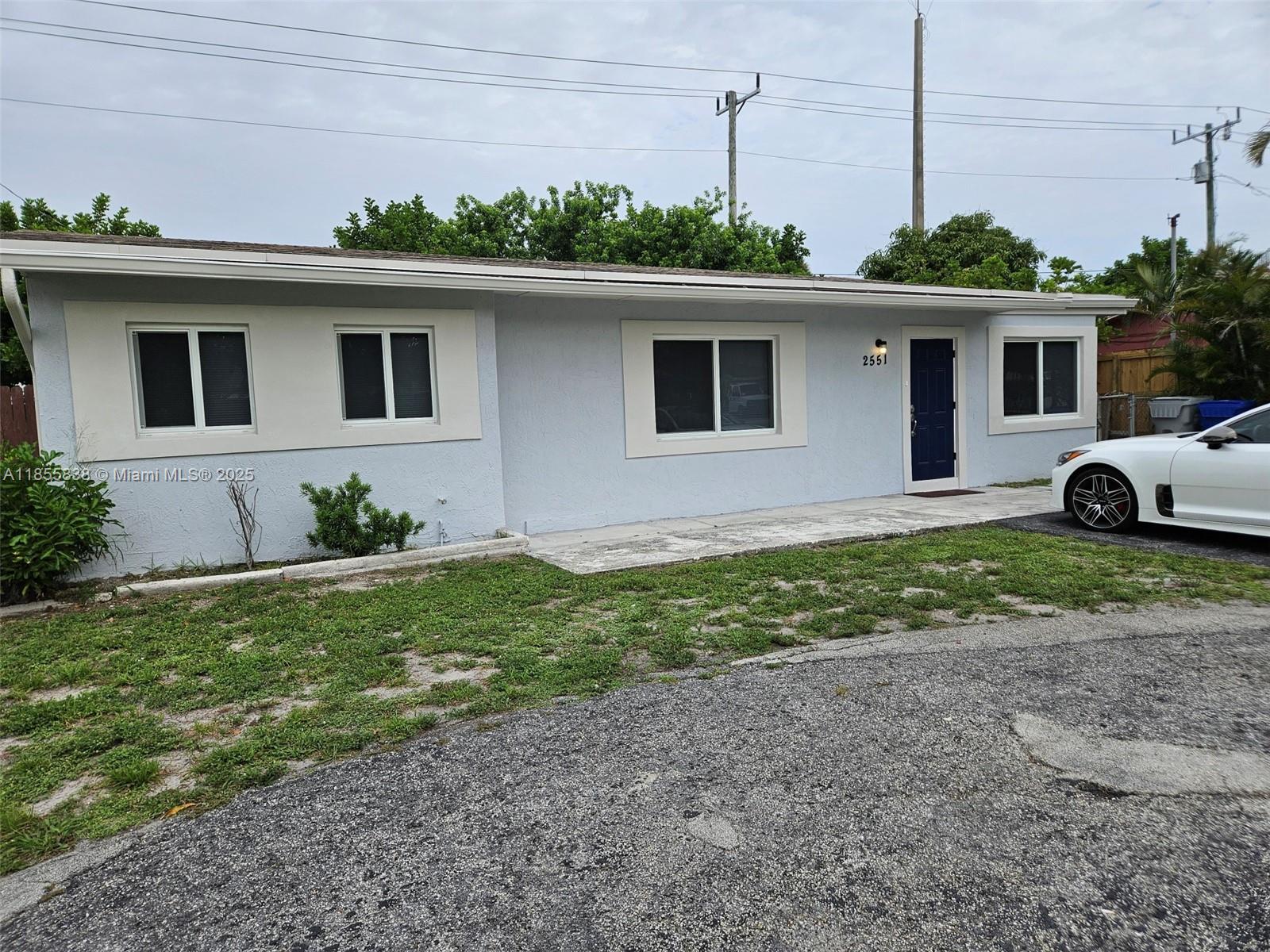 MUST SEE IT. TOTALLY RENOVATED!!!!! Single family home east of 95 and few blocks from US1. Beautiful 3 bedroom 2 bathrooms with extra family & laundry rooms. Located 2 miles from Pompano Beaches. Very large master bedroom living room and family room. Walkin closet in master. NEW IMPACT WINDOWS AND DOORS. ALL IS NEW INCLUDING: FLOORING KITCHEN, BOTHROOMS, APPLIANCES, WATER HEATER, AC, FANS, BLINDS and more. New kitchen with granite counters. A LOT OF LIGHT COMING FROM MANY LARGE WINDOWS. New recessed downlights with dimmers all around the house. Large shower in master bathroom with double sink vanity. Fenced back yard with 800 sqf open porch with plenty of room for a pool. Circular parking for 4 vehicles.