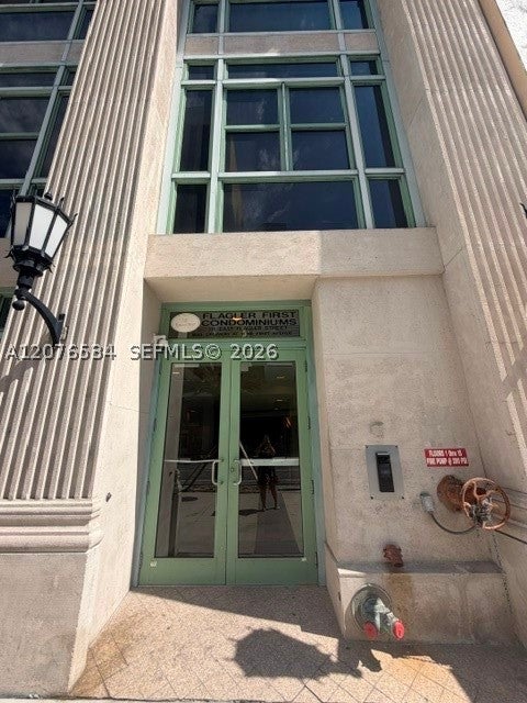 111 E Flagler St 406