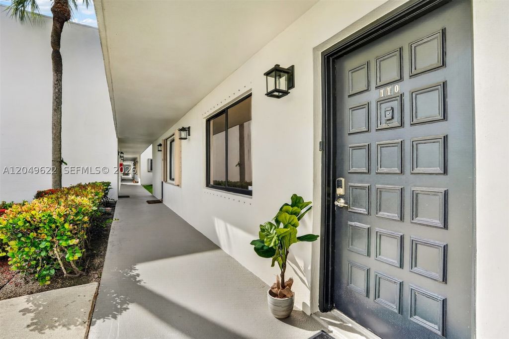 Photo of 9920 NW 68th Pl #110, Tamarac, FL 33321 (MLS # A12049622)