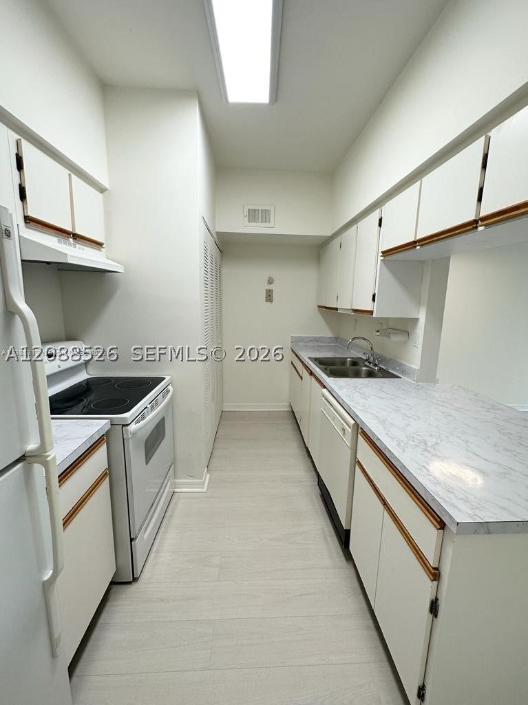 View photos, virtual tours, details... 18316 NW 68th Ave I