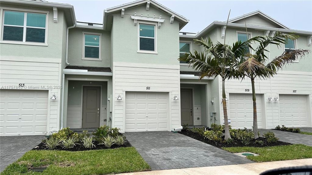 Photo of 511 SE Rivergrass St #511, Port Saint Lucie, FL 34984 (MLS # A11757845)