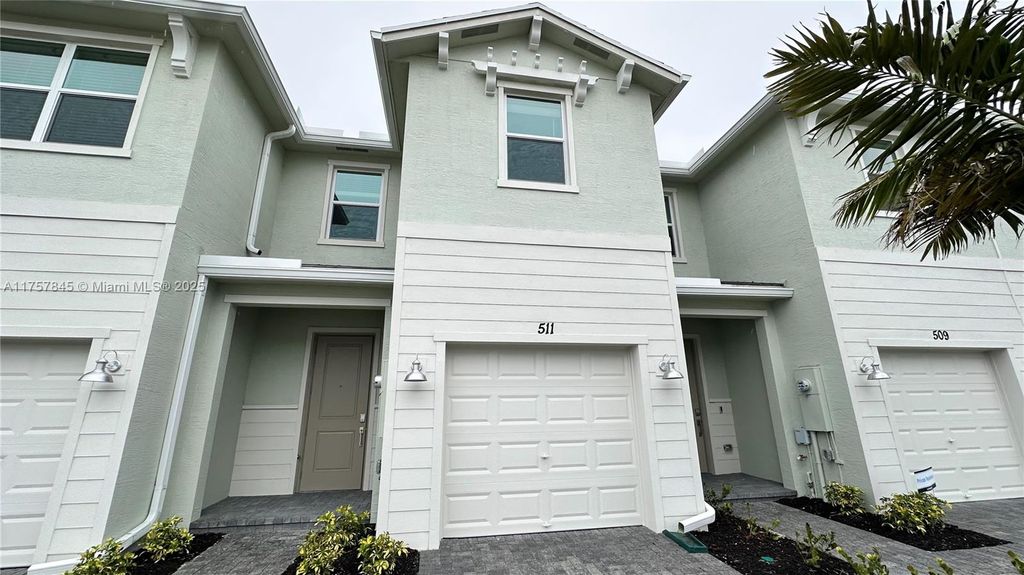 Photo of 511 SE Rivergrass St #511, Port Saint Lucie, FL 34984 (MLS # A11757845)