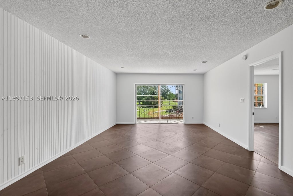 Photo of 6201 N Falls Cir Dr #207, Lauderhill, FL 33319 (MLS # A11997153)
