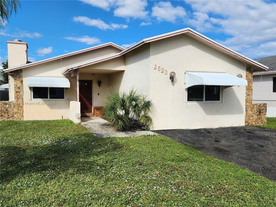 Home in desirable Hollywood East. NO HOA. True 4/2 bedroom home with high-efficiency A/C & Hurricane impact windows - can easily be converted to a 3/2 plus studio with a bathroom, and plenty of space for a swimming pool. Great investment property. Non-flooding area within 10minutes drive to the Beach. Close to Hard Rock and Dania Pointe