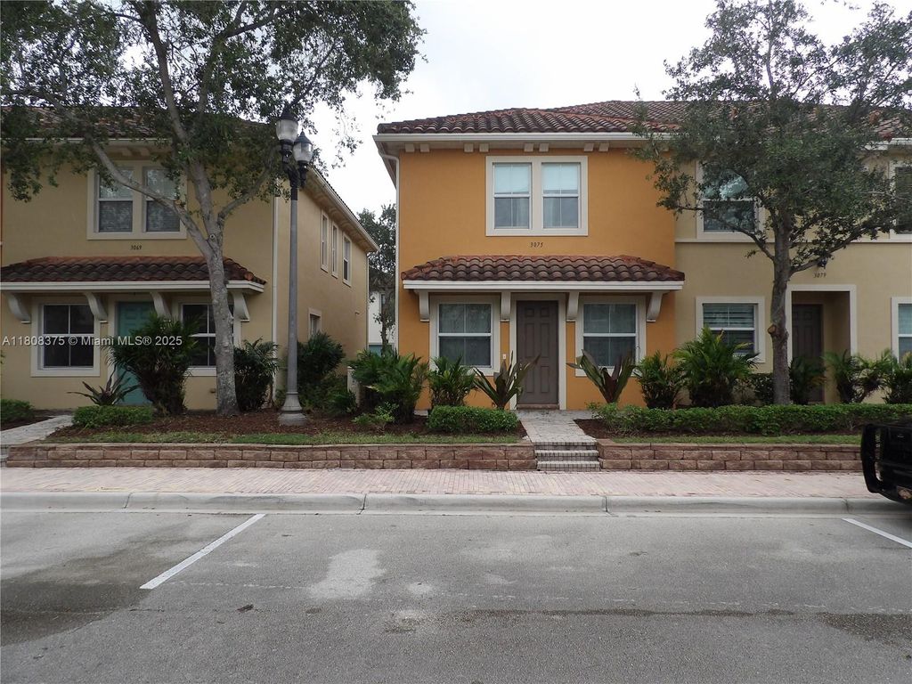 Photo of 3075 NW 126th Ave #C-83, Sunrise, FL 33323 (MLS # A11808375)