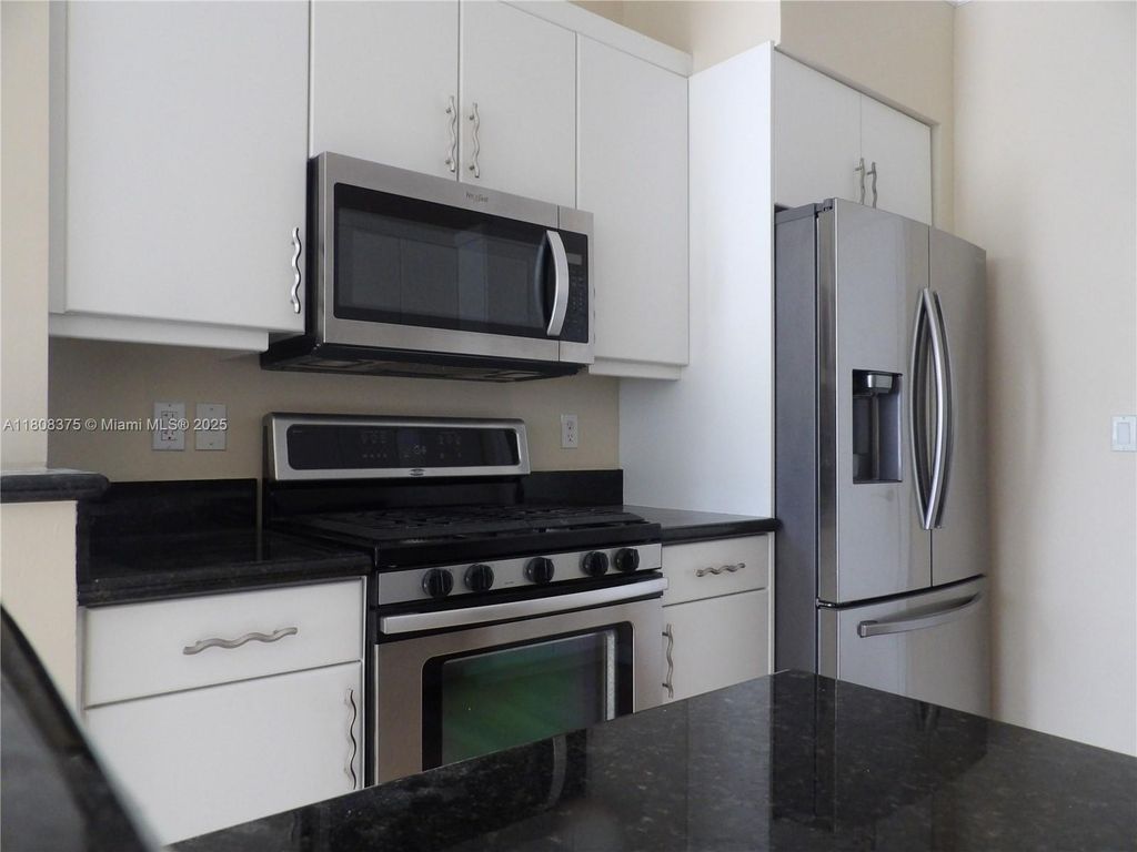 Photo of 3075 NW 126th Ave #C-83, Sunrise, FL 33323 (MLS # A11808375)