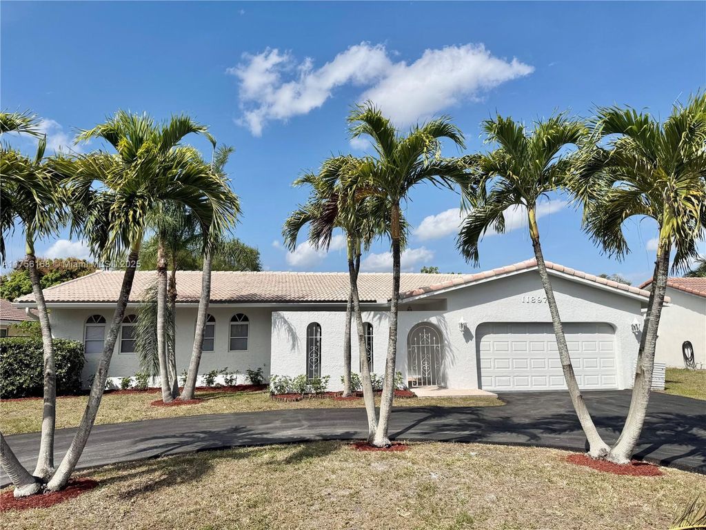 Photo of 11897 NW 30th St, Coral Springs, FL 33065 (MLS # A11756168)