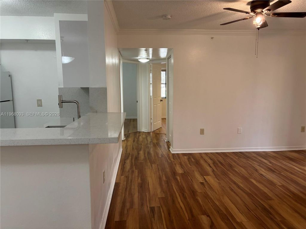 Photo of 2433 Centergate Dr #202, Miramar, FL 33025 (MLS # A11968093)