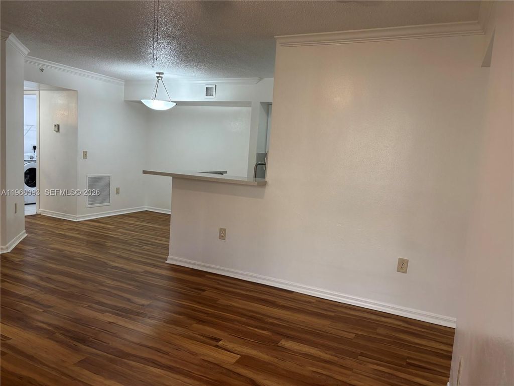 Photo of 2433 Centergate Dr #202, Miramar, FL 33025 (MLS # A11968093)