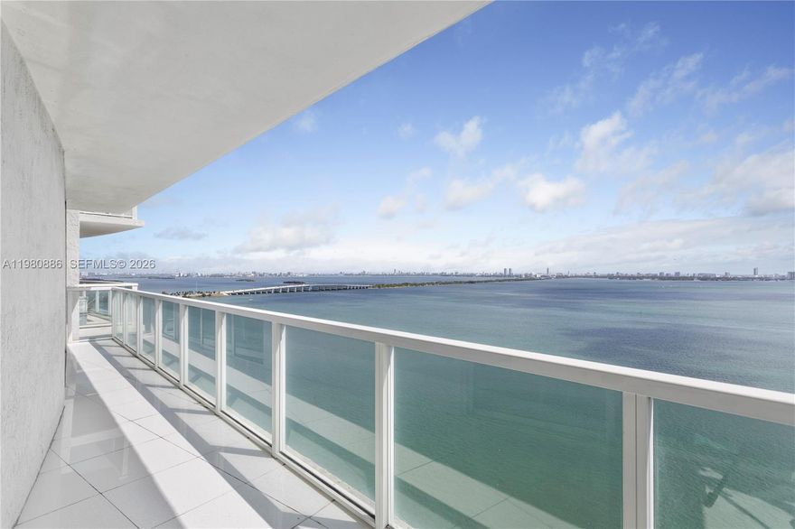 Rare opportunity to own a spacious 1-bedroom, 1.5-bath residence with direct, unobstructed views of Biscayne Bay and Miami Beach from both the living area and bedroom. This beautifully maintained home features porcelain flooring throughout, custom built-out closets, designer lighting, and elegant wallpaper accents that add warmth and character. The open layout is filled with natural light and highlights breathtaking waterfront views from every main living space. Washer and dryer in-unit.

Enjoy full-service waterfront living with premium amenities including a 24-hour door person, resort-style pool overlooking the bay, fully equipped fitness center, sauna and steam rooms, billiards room, party room, and more. Ideally located in the heart of Edgewater with immediate access to Midtown, Wynwood, the Design District, and Miami Beach. Offered furnished (excluding artwork) for a seamless move-in or investment opportunity.