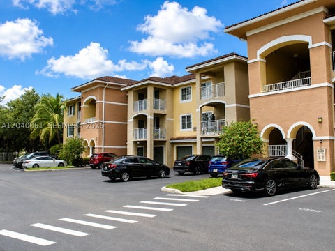 Photo of 6458 Emerald Dunes Dr #303, West Palm Beach, FL 33411 (MLS # A12040061)
