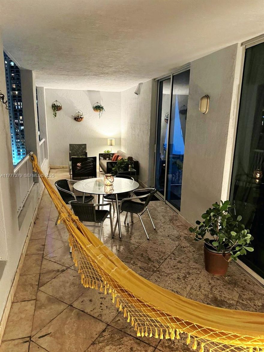 Building has RESERVES, FHA approved  2 bed / 2 bath unit located on the 27th floor in the heart of Brickell. Features include wood floors throughout, renovated interior, and a spacious 400 SF covered balcony/terrace with city and Skiyline views. Assigned covered parking included. The building offers modern amenities such as a gym and pool, along with 24/7 security. Located just 2 blocks from the Miami Metro Mover, 4 blocks from Publix, and steps from the best dining, shopping, and entertainment. Biscayne Bay is just steps away, and the location provides quick access to I-95 (5 minutes) and Miami Beach (15 minutes). Short-term and long-term rentals allowed (30-day minimum), making this a great opportunity for both end-users and investors seeking flexible leasing options. SEE Tour video