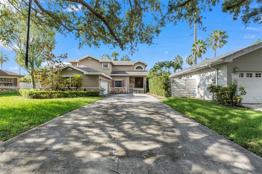 Welcome to this stunning 3-bedroom, 3-bathroom single-family home in the desirable Village Homes community at Country Walk. Featuring a thoughtfully designed layout, the first floor offers a bedroom with a full bath—perfect for guests—along with laminate flooring throughout the main living areas and stairs. The open kitchen comes equipped with a refrigerator, dishwasher, microwave, and electric range. Upstairs, enjoy carpeted bedrooms, a spacious master suite with walk-in closet plus three additional closets, and a large master bathroom with dual sinks, jetted Roman tub, and separate shower. Additional highlights include a large independent den upstairs ideal for an office or relaxation, AC (2017), roof (2013), Rheem tankless water heater, and LG washer & dryer. Step outside to a covered patio with an outdoor kitchenette featuring a sink and gas grill—perfect for entertaining. This home offers comfort, style, and versatility in one of Country Walk’s most sought-after​​‌​​​​‌​‌​​​‌‌​​​‌‌‌​​‌​​‌‌​​​​ neighborhoods!