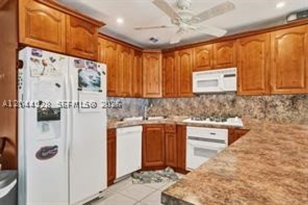 Photo of 1061 NE 26th Ave #1061, Pompano Beach, FL 33062 (MLS # A12044928)