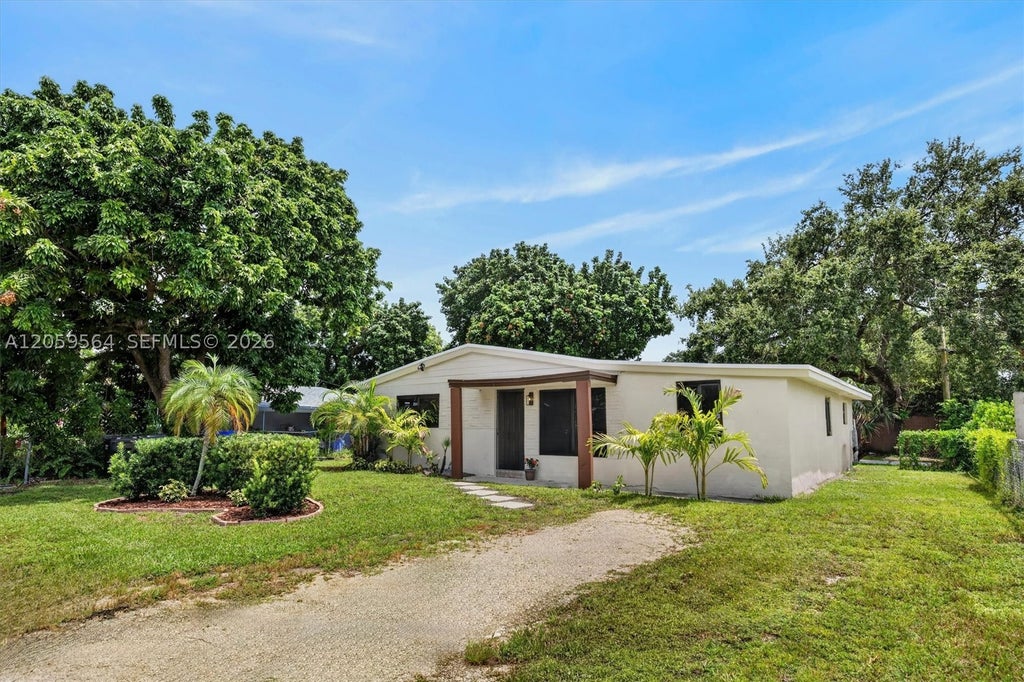Photo of 5626 Raleigh St, Hollywood, FL 33021 (MLS # A12059564)