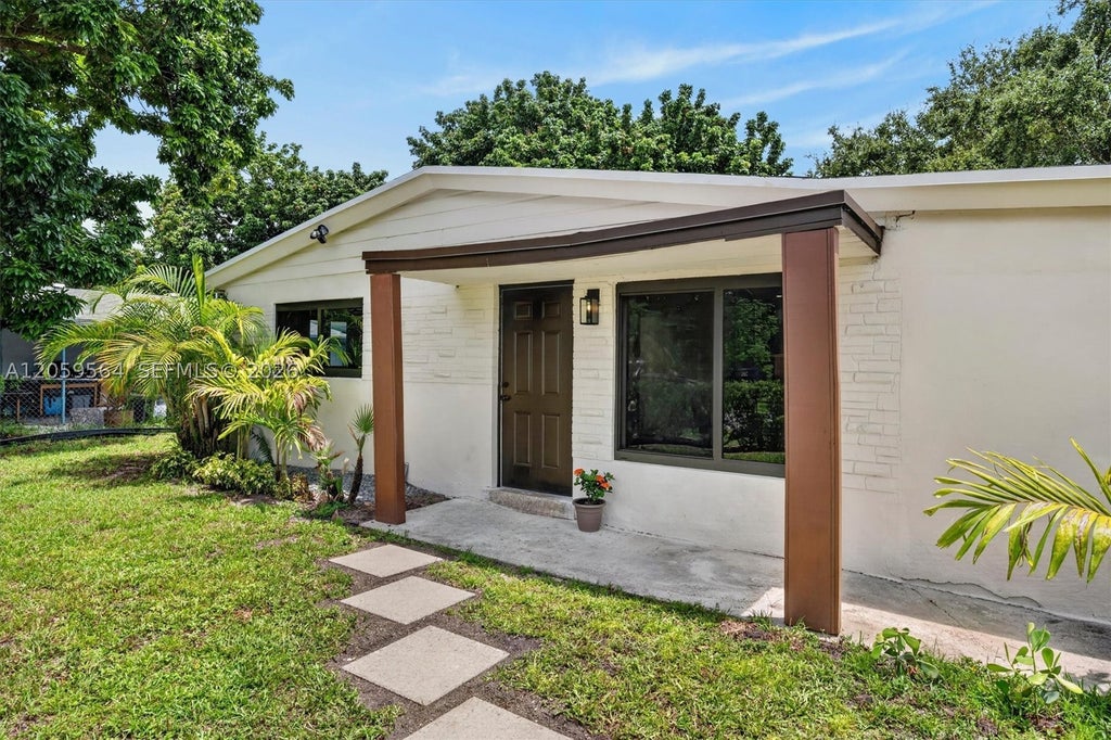 Photo of 5626 Raleigh St, Hollywood, FL 33021 (MLS # A12059564)