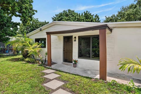 Photo of 5626 Raleigh St, Hollywood, FL 33021 (MLS # A12059564)