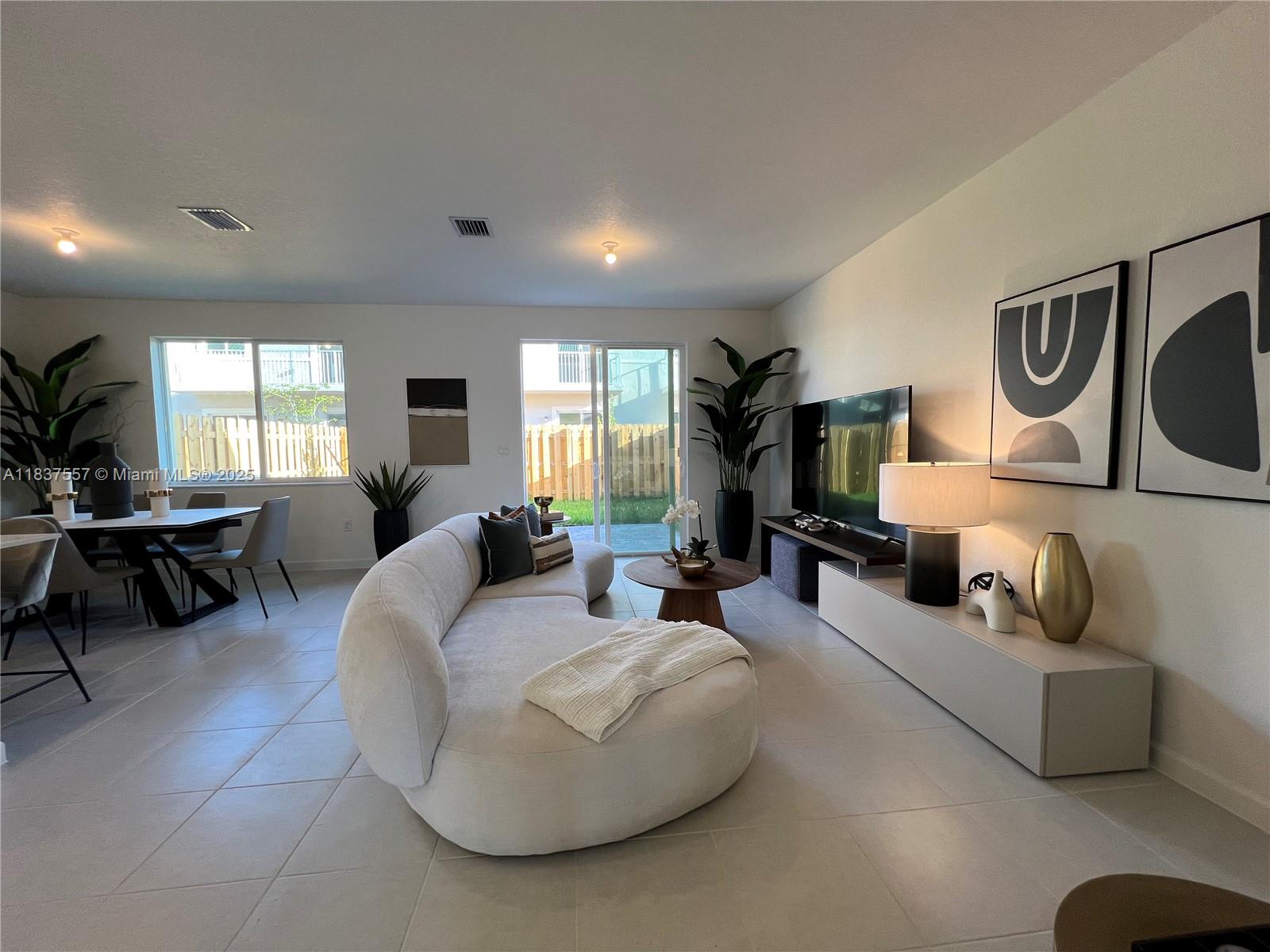 For Rent | Brand-New 3-Bed, 3.5-Bath Townhome in Terra Sol. BE THE FIRST TO LIVE IN THIS MODERN 2-STORY BRAND NEW TOWNHOME offering 1,671 sq. ft. of beautifully designed space. Features include a 1-car garage, 2 outdoor parking spaces, private backyard, energy-efficient design & smart home tech. Enjoy brand-new stainless steel appliances & a full-size brand-new washer & dryer. The first floor offers open-concept living & a guest half-bath. Upstairs, you'll find all 3 bedrooms. The primary suite has an en-suite bath, walk-in closet & balcony. A second bedroom has its own bath & the third has access to a hallway bath. THE PROPERTY WAS STAGED FOR PHOTOS ONLY — PROPERTY IS RENTED UNFURNISHED. Act fast once amenities are complete, rental prices will rise. Move-in ready!