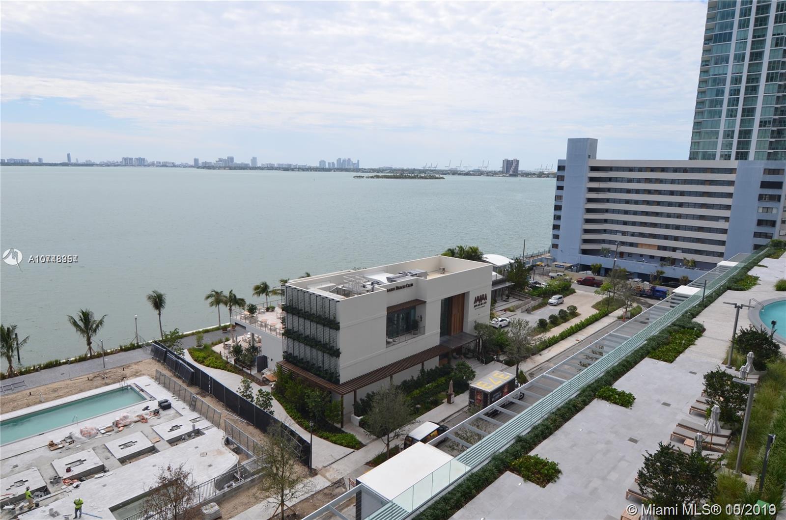 CORNER UNIT WITH SPECTACULAR OCEAN VIEWS FLOOR TO CEILING WINDOWS. THIS BRIGHT AND SPACIOUS APARTMENT OFFERS 1 BEDROOM + DEN WITH 2 FULL BATHS. HIGH END AMENITIES THAT INCLUDE STATE OF THE ART THEATER, PARTY ROOMS, WINE CELLAR WITH A WINE TESTING ROOM, CIGAR LOUNGE, TENNIS COURT, GYM AND GREAT POOL SERVICES WITH AN OUTDOOR GRILL AND A HUGE POOL FOR ITS RESIDENTS, PARAISO BAY ALSO OFFERS AN AMAZING SPA, SAUNA AND MASSAGE ROOM. WATER, BASIC CABLE AND INTERNET INCLUDED. BEACH CLUB RESTAURANT BY THE BAY WITH ACCLAIMED RESTAURANT BY CHEF MICHAEL SWARTZ. ***BEST DEAL, EASY TO SHOW***