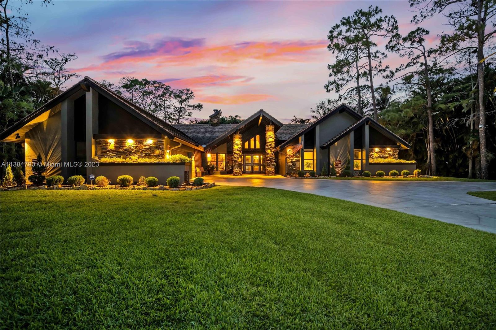 Nestled in Pine Tree Estates, this stunning Craftsman-style home features a NEW ROOF and IMPACT WINDOWS. The lush landscaping and charming porch lead to a warm and inviting great room with impeccable stone and woodwork. The serene master suite boasts a spa-like master bath with a luxurious clawfoot tub and separate shower, and every view overlooks the breathtaking outdoor oasis, complete with a custom saltwater pool and highly desirable coping. A mother-in-law quarters, gazebo, and air-conditioned tree house are just a few of the many highlights. This meticulously cared-for gem perfectly combines luxurious living with unparalleled craftsmanship. Come experience the ultimate in elegance and sophistication in Parkland's most exceptional home, where opulence and style unite. A School District