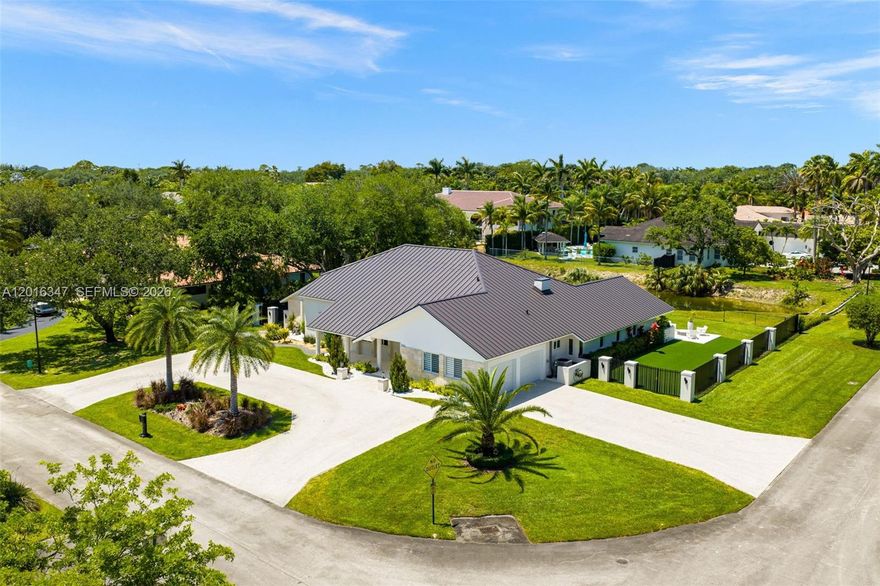 Your dream home is here, just as always wanted it! Fully reimagined, this turn-key waterfront 5 Bed - 3.5 Bath home sits on a prime corner lot in prestigious Galloway Glen. One story with soaring vaulted ceilings and an open, bright layout with an organic flow. The custom pivot entry door sets the tone from the start. It’s not just an entrance, it’s a statement, flooding the space with light and giving the home an immediate sense of scale and design. The heart of the home, a stunning brand-new Italian kitchen with Neolith countertops, bleached oak-finish cabinets, and Sub-Zero & Wolf appliances, that flows into the living areas complemented with a new custom bar, new smart linear electric fireplace, and integrated Sonos sound system. The oversized primary suite with a spa-like bath feels calm, private retreat. Outside, a new refinished heated pool with glass tiles and new expanded deck, turfgrass, and layered lighting overlook the canal. NEW METAL ROOF, NEW paver driveway, all impact windows and doors, electric shades, new laundry, 2-car garage, 3 ACs, and 24/7 FST patrol. Perfection! Is this where your search ends?