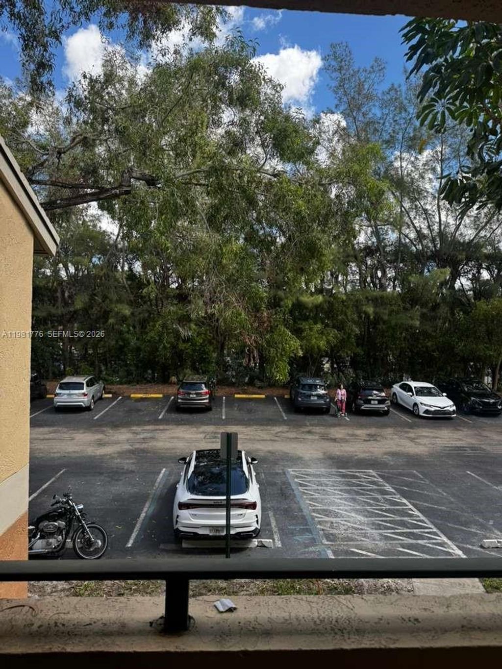 Photo of 9999 Summerbreeze Dr #910, Sunrise, FL 33322 (MLS # A11981776)