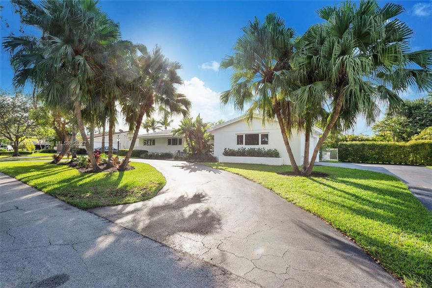 Spacious and bright 4 bedroom home in North Palmetto Bay's desired Royal Palm Harbor neighborhood.  Expansive views of the pool and oversized backyard, with sliding doors throughout to allow for effortless entertaining.  Kitchen is equipped with white wood cabinets, plenty of storage, a peninsula for casual dining, and opens to the Family Room and formal Dining Room.  Main Bedroom features a walk-in closet, en suite bathroom, and opens to the pool.  
Two-car garage, 3 year old roof, impact glass, and plantation shutters. 17,000+ square foot lot, perfect for outdoor play, gatherings, and pool days. Circular and side driveway with room for a boat. Convenient to excellent schools, shopping, and parks.
