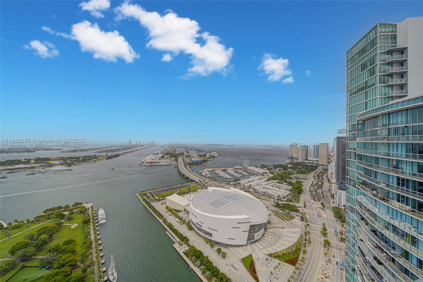 Live above it all on the 52nd floor with stunning, direct views of Biscayne Bay, Miami Beach, and the city skyline. This 1BD + den, 1.5BA sky-high condo features 10' floor-to-ceiling impact glass, a spacious flow-through layout, marble floors, Italian cabinetry, and top-tier Miele & Sub-Zero appliances. The large primary suite includes panoramic views and walk-in closets. Enjoy luxury amenities: 2 pools, spa, state-of-the-art gym, resident lounge, theater, kid's playroom, concierge, and valet. A true condo in the sky.