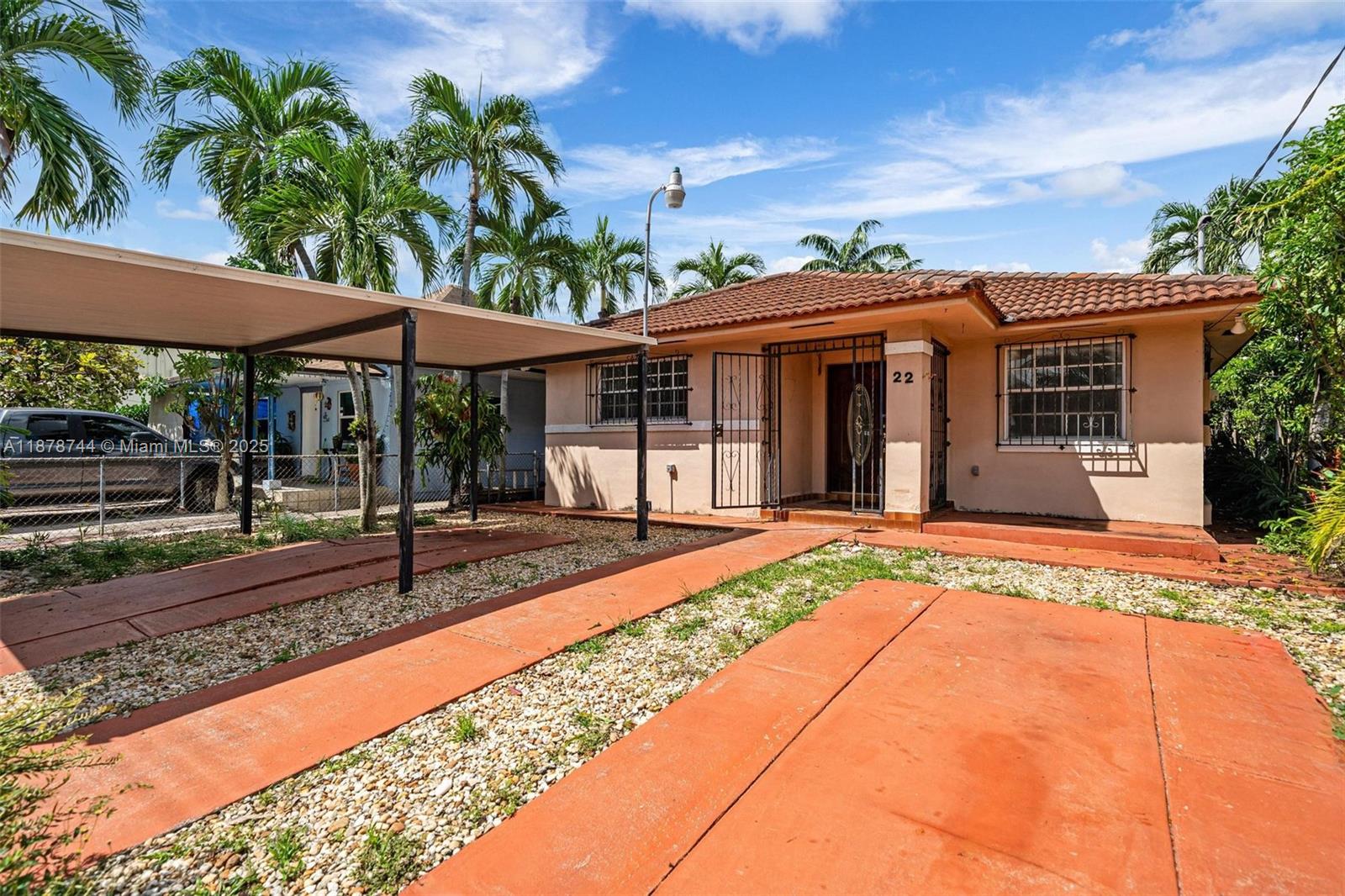 Welcome to this 3-bedroom, 2-bath home in the Flagami neighborhood, just minutes from Miami International Airport, Coral Gables, and Downtown Miami. The home offers practical living spaces with a functional kitchen and a private backyard for everyday use, plus a covered carport for added convenience. Its central location provides easy access to major highways, shopping, and dining.