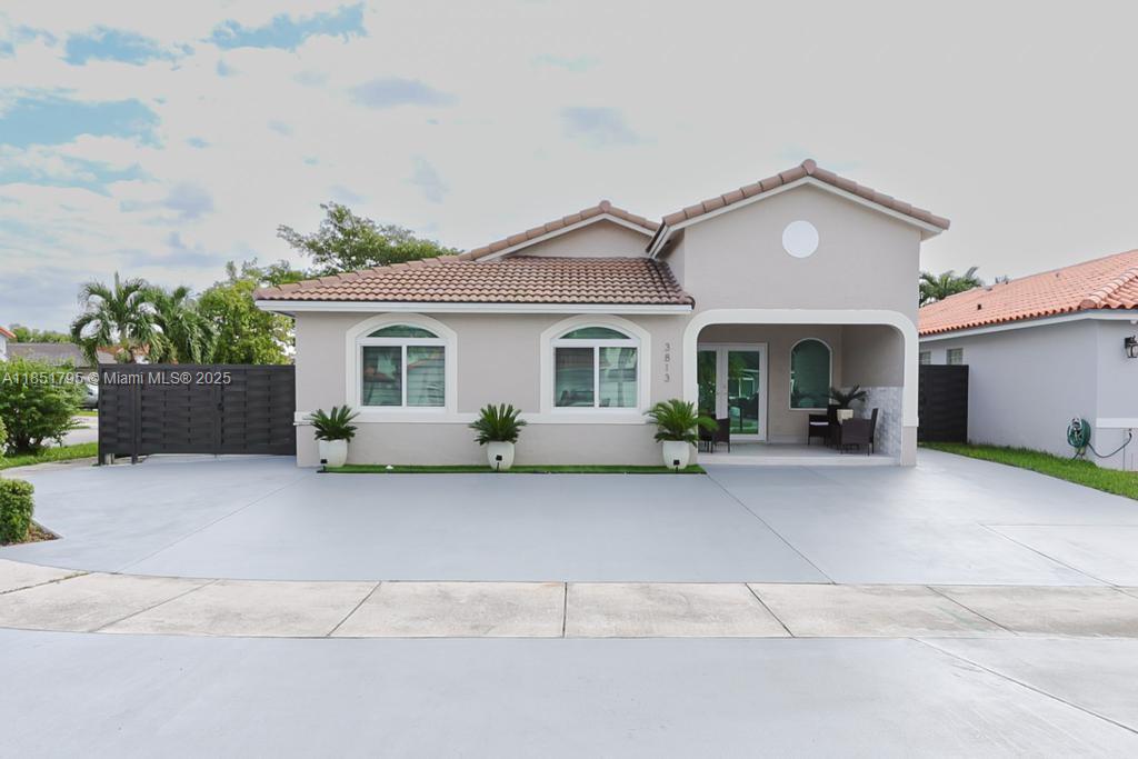 Beautiful home completely upgraded. The property features an open layout, bright areas and ample rooms as well as impact windows and door. Great location close to major highways, restaurants, and more. The roof is only 4 years old! The Rheem A/C system is also less than 6 years old. The fenced-in patio and yard have cement flooring, ideal for entertaining or parking a boat or RV. The corner side of the property features a privacy fence with a large gate for vehicles or trailers.