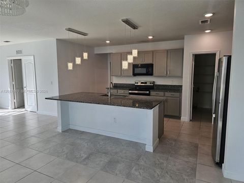Photo of 831 Bent Creek Dr, Fort Pierce, FL 34947 (MLS # A12017810)