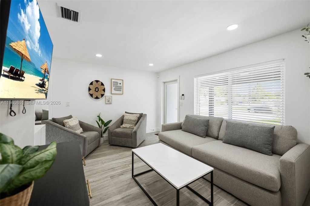 Photo of 1448 NE 25th Ct, Pompano Beach, FL 33064 (MLS # A11980861)