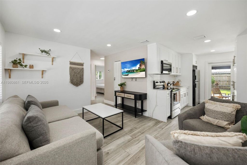 Photo of 1448 NE 25th Ct, Pompano Beach, FL 33064 (MLS # A11980861)