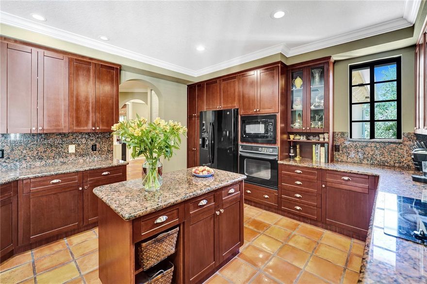 Welcome Home to Mariposa, located in the heart of Weston! Proudly offered by the original owners, this stunning 3 Bedroom, 2.5 Bath, corner residence is truly move-in ready with the extra peace of mind of a brand new roof. Located in the desirable Mariposa gated community, it’s just steps from Weston Town Center and across from The Club at Weston Hills. 
The extra-wide layout offers privacy surrounded by lush landscaping. Inside, enjoy custom high doorways, a grand staircase, plantation shutters inside & accordion shutters outside. The chef’s kitchen features ceiling-height cabinetry, and a large screened-in patio which extends living space outdoors. A 2-car garage with a large driveway completes this private retreat, blending style, comfort, & Weston living at its best. See for yourself!