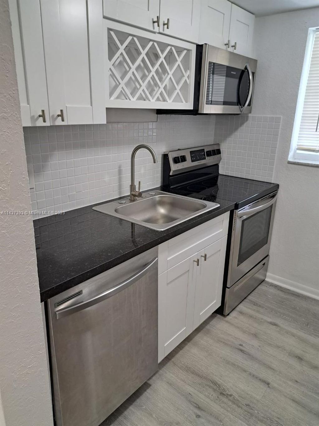 Photo of 500 E Country Club Cir #2, Plantation, FL 33317 (MLS # A11437383)