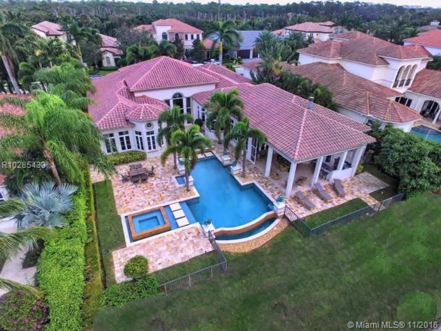 Enjoy the incredible view from this home situated amongst the community's most luxurious custom homes. This Single Story Home is located on one of the best Lake/Golf Course views in Palm Beach County.  Luxury appointments inlcude an expansive master suite , a large club room, gourmet kitchen, spacious  living areas, fabulous outdoor lounging area, covered patios, retractable screens, spacious living areas, marble floors and custom built-ins.  Enjoy the spectacular Frenchmans Reserve lifestyle with a privat