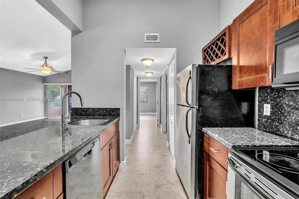 Photo of 2881 N Oakland Forest Dr #212, Oakland Park, FL 33309 (MLS # A11993964)