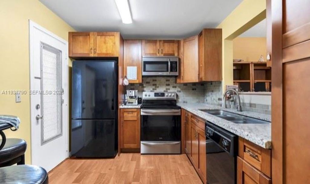 Photo of 1024 SE 3rd Ave #304, Dania Beach, FL 33004 (MLS # A11938790)