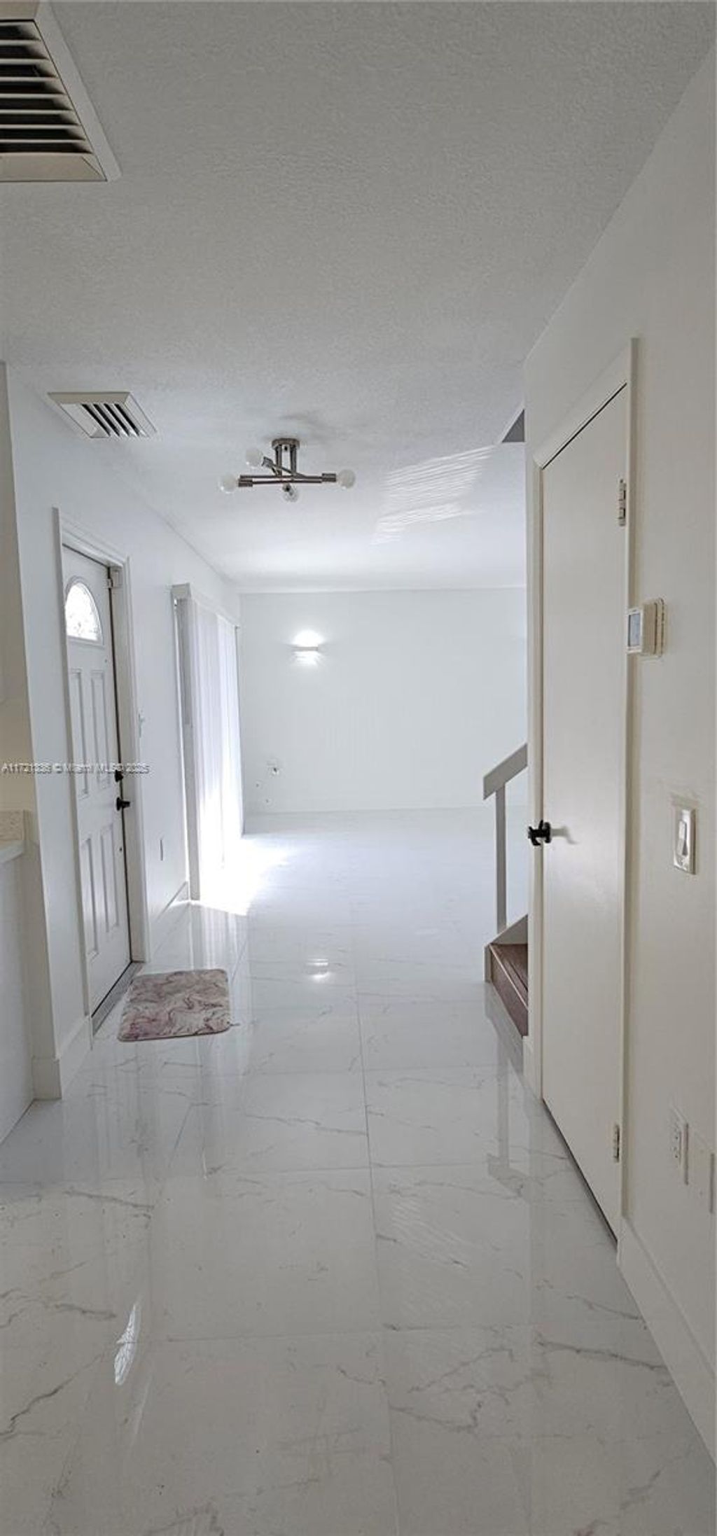 Photo of 3310 S Meridian Way #B, Palm Beach Gardens, FL 33410 (MLS # A11721336)