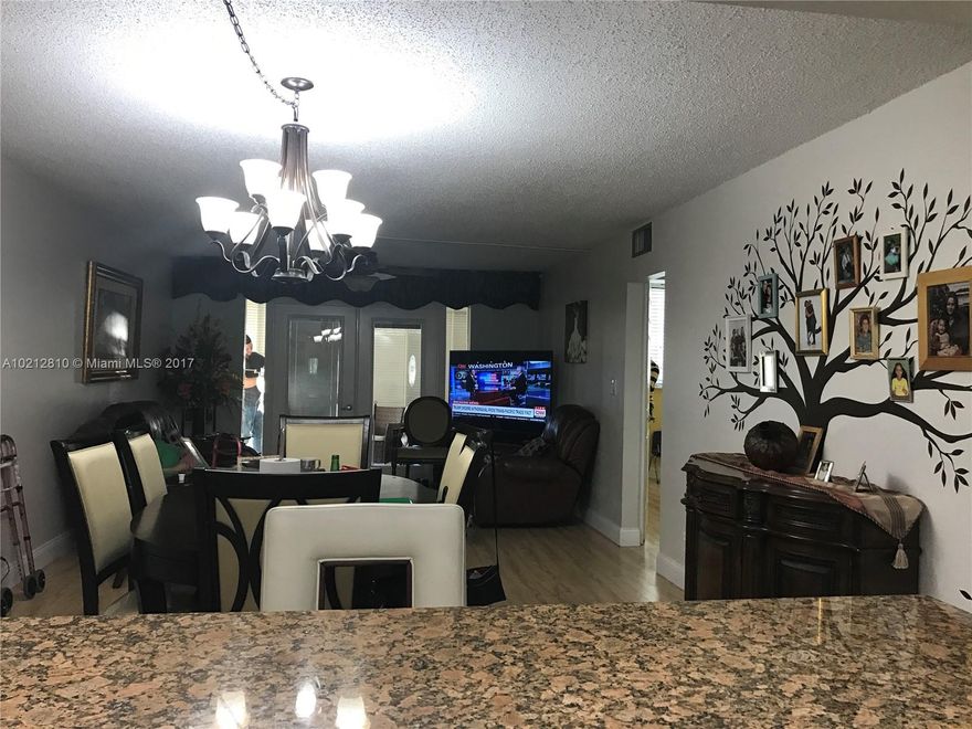 STUNNING AND REMODELED 2/2 IN 55+ HOLLYBROOK COMMUNITY! ELEGANT FRENCH DOORS OPENS UP TO SPACIOUS SCREENED BALCONY WITH VIEW OF THE LAKE! THIS 55+ADULT COMMUNITY OFFERS GOLF GREEN FEES FOR RESIDENTS, 14 TENNIS COURTS, 7 POOLS, THEATER, FITNESS CENTER, RESTAURANT AND MUCH MORE! TOP OF THE LINE WASHER & DRYER IN UNIT!