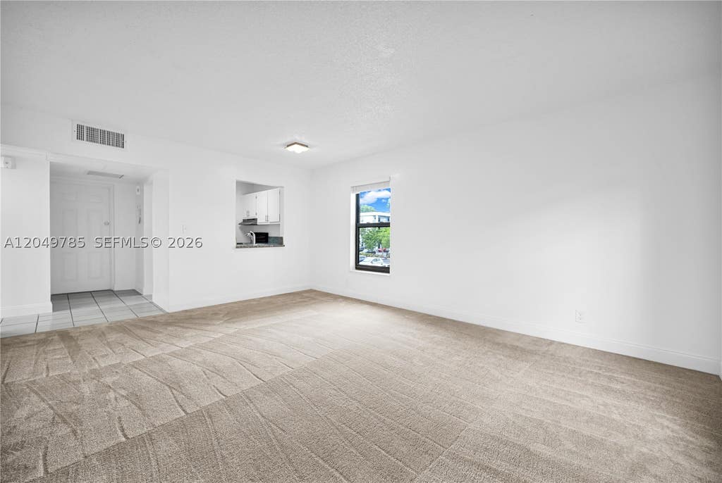 Photo of 7550 Stirling Rd #C203, Davie, FL 33024 (MLS # A12049785)