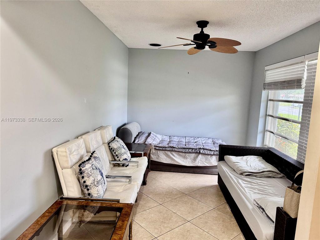 Photo of 8838 Bella Vista Dr, Boca Raton, FL 33433 (MLS # A11973338)