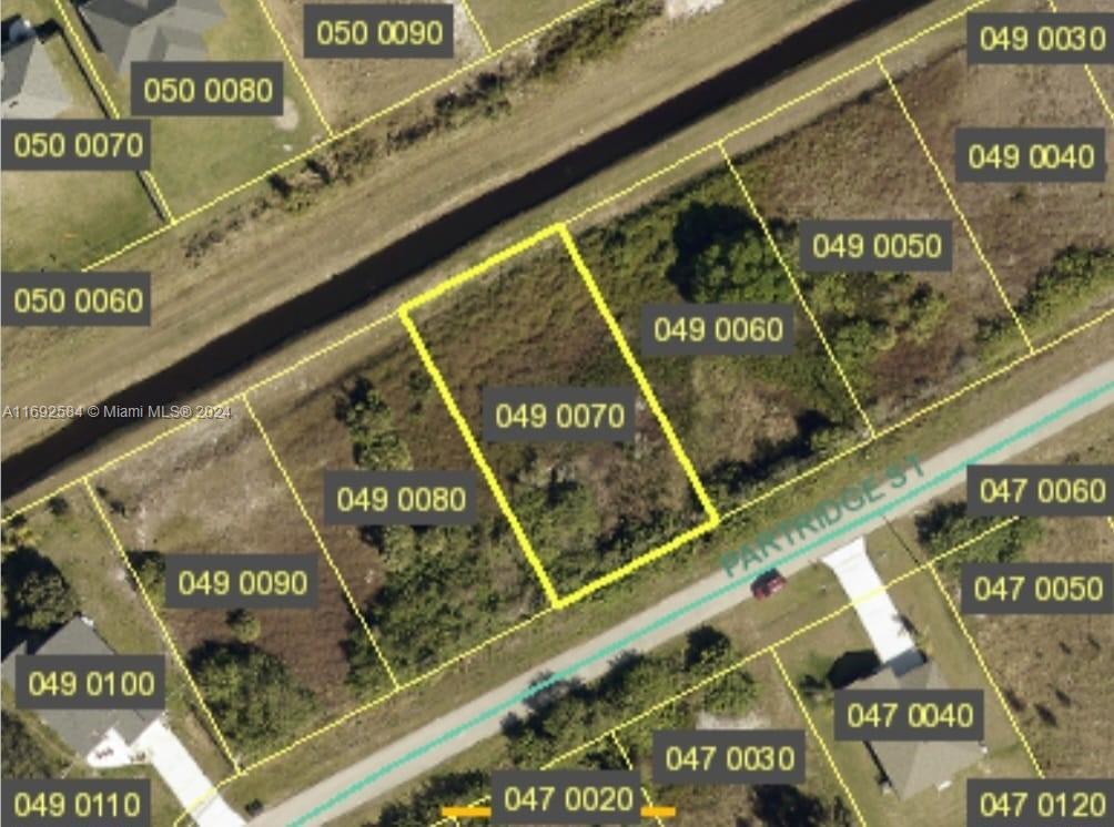 GREAT OPPORTUNITY FOR DEVELOPERS, INVESTOR OR BUILD YOUR DREAM HOUSE. Is located in one of Florida’s most growing area and development. Natural beauty, surrounded by Growing Community: Lehigh Acres is a thriving community, making it an excellent investment opportunity. Located near major highways, at 19 min to the Forum shopping center with restaurants and entertainment, at 30 min to Florida Gulf Coast University, No HOA.