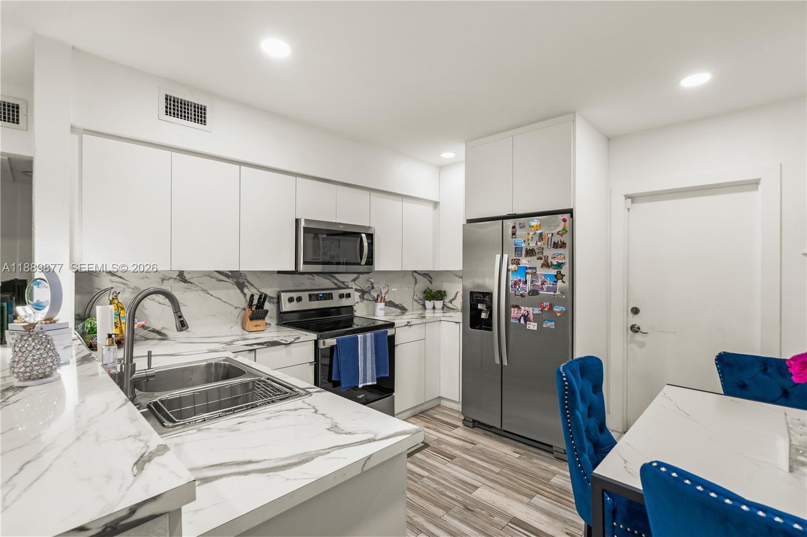 VILLAGE HOMES & CONDOS AT - Residential