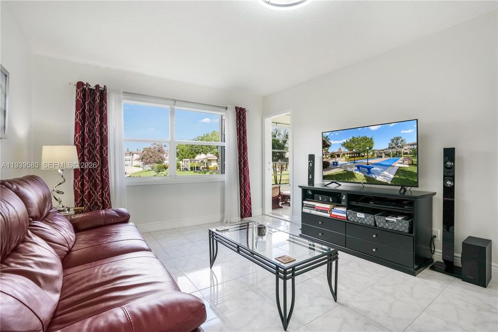 Photo of 4801 NW 34th St #406, Lauderdale Lakes, FL 33319 (MLS # A11939580)