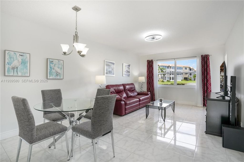 Photo of 4801 NW 34th St #406, Lauderdale Lakes, FL 33319 (MLS # A11939580)