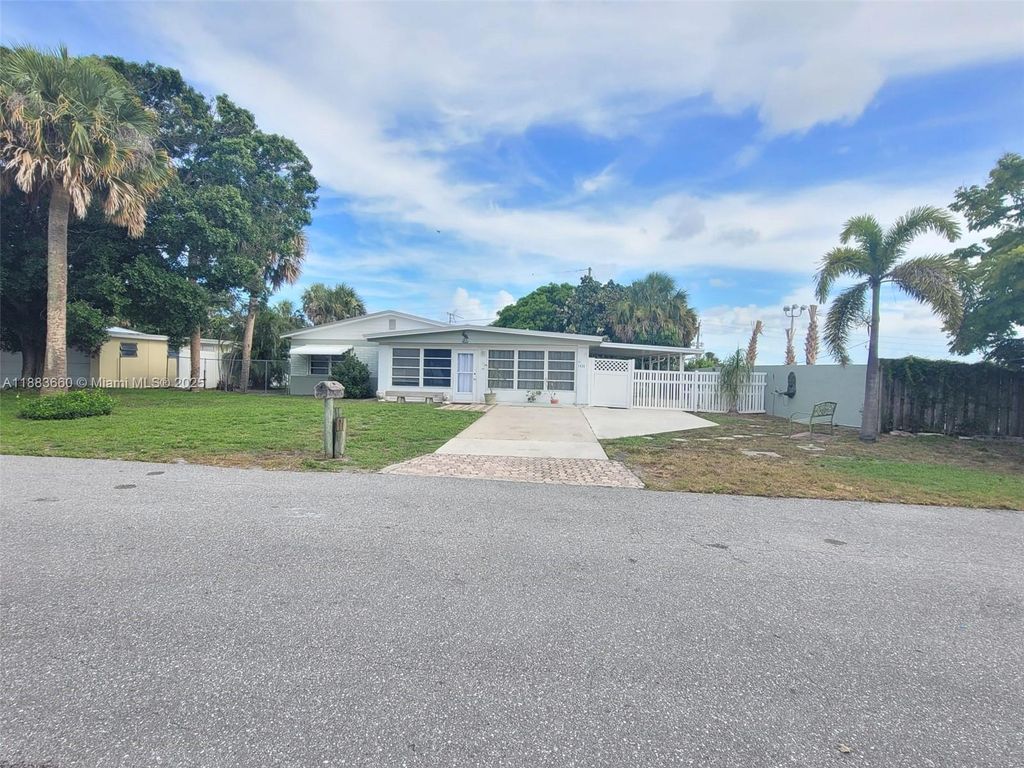 Photo of 1624 NE Orion St, Jensen Beach, FL 34957 (MLS # A11883660)