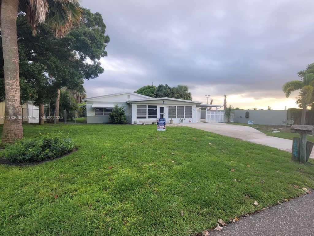 Photo of 1624 NE Orion St, Jensen Beach, FL 34957 (MLS # A11883660)