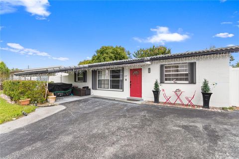 Photo of 1000 NW 23rd Ter, Pompano Beach, FL 33069 (MLS # A11994505)