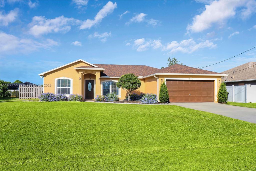 Photo of 5867 NW Zenith Dr, Port Saint Lucie, FL 34986 (MLS # A11483699)